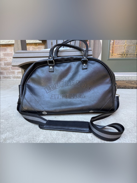 lululemon athletica Handbags - lululemon athletica Black Faux Leather Duffel with Striped Shoulder Strap, EUC!!